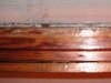 Metalen driehoekjes onder de stopverf (2009)